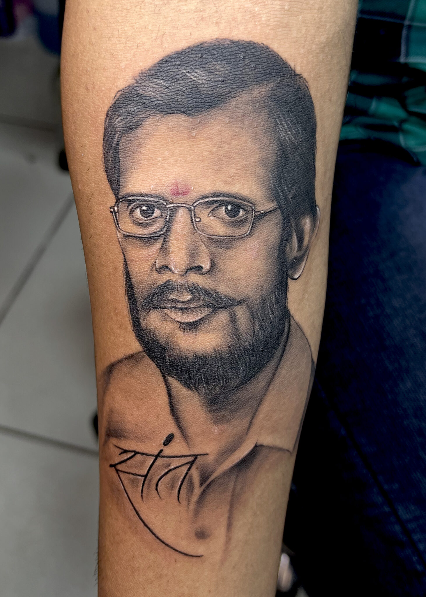 sant face tattoo